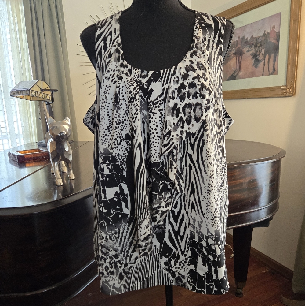 Black and white crazy print sleevless blouse.